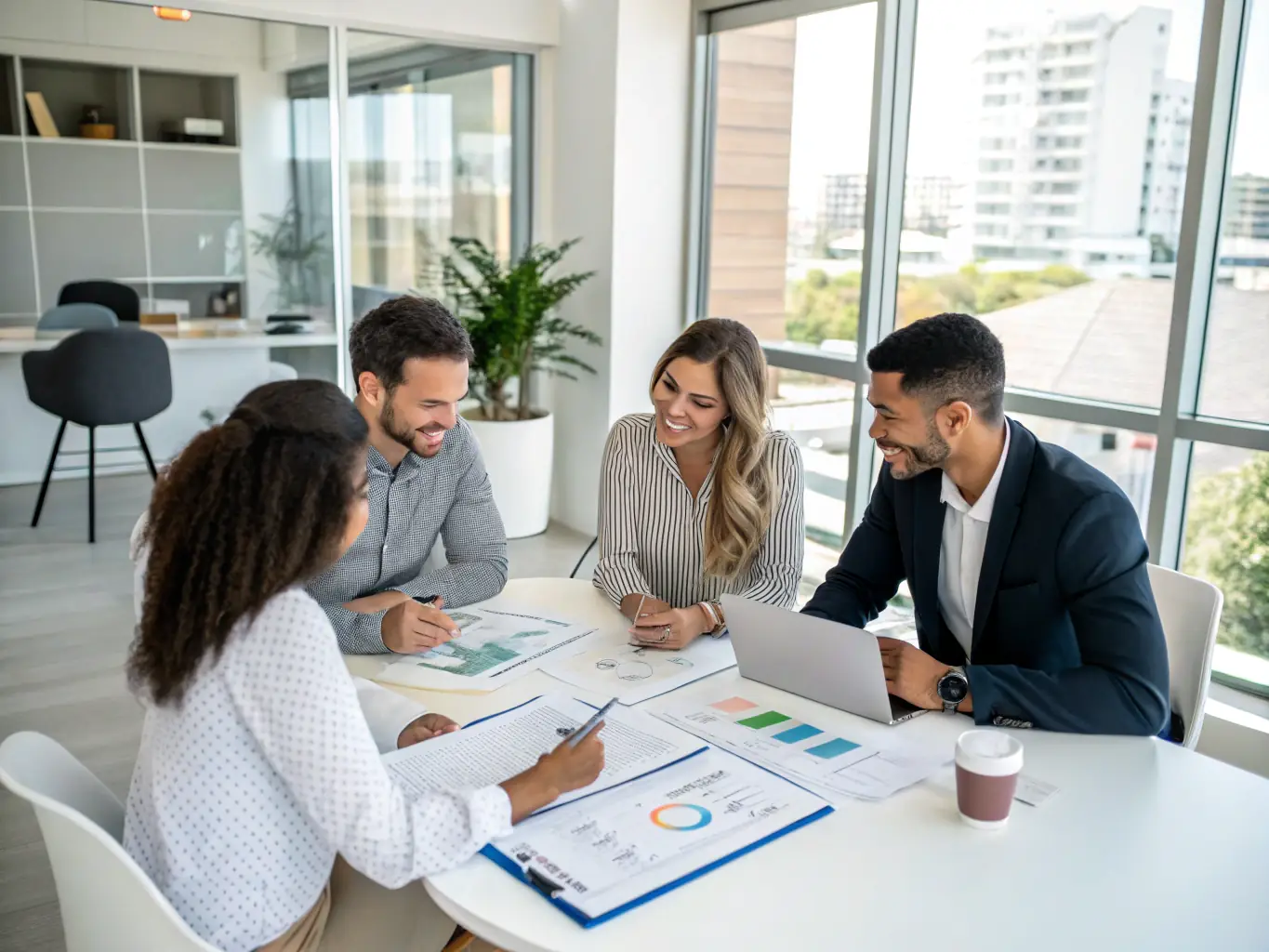 An image of a diverse team of property managers and financial analysts collaborating on a property management strategy, showcasing the comprehensive approach of City One Services Ltd.